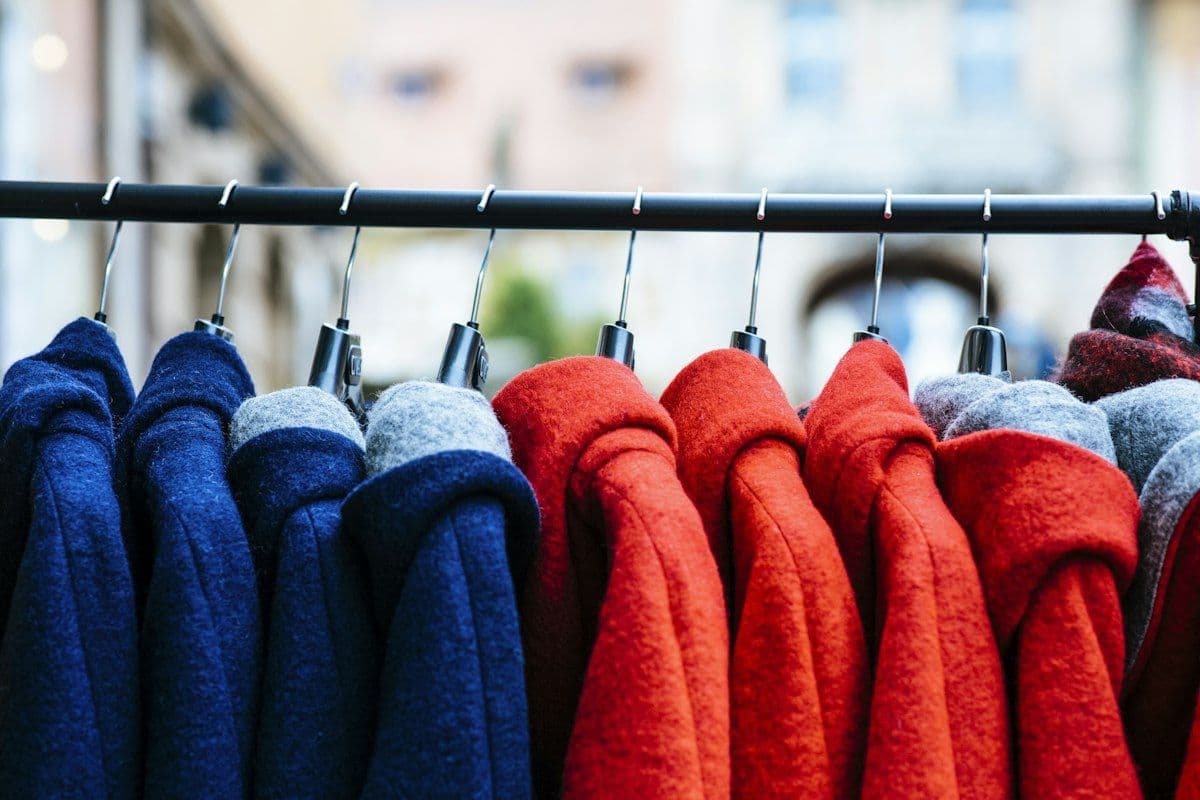 Rail of Ember puffer jackets in deep glacier blue and ember red